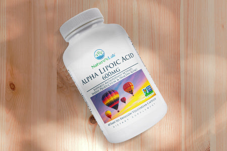 Nature's Lab Alpha Lipoic Acid on a wooden background