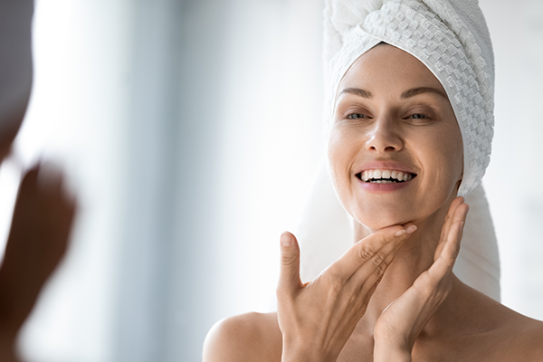 Woman smiling in the mirror