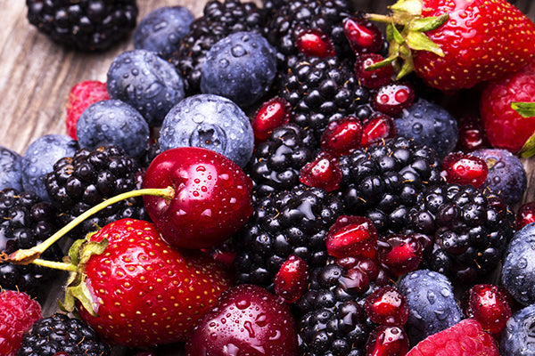 Closeup of cherries, berries and strawberries
