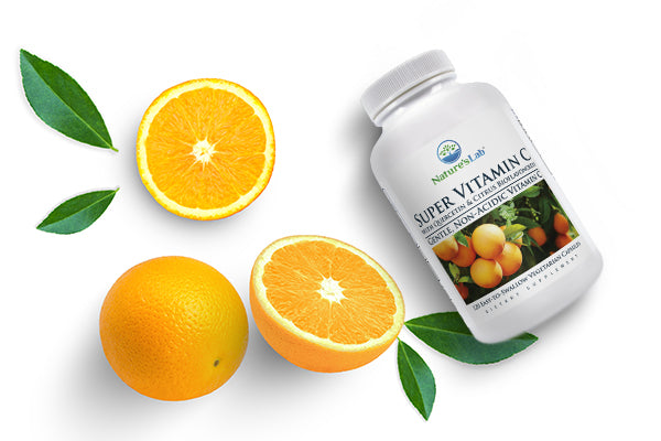 Orange slices next to Nature's Lab Super Vitamin C