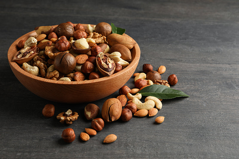Walnuts, cashews, almonds, nuts in bowl