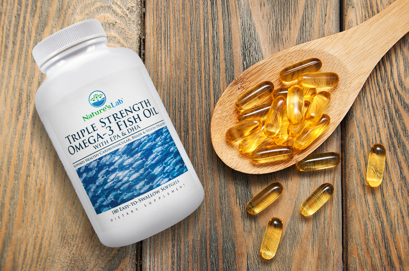 Nature's Lab Fish Oil on wooden background