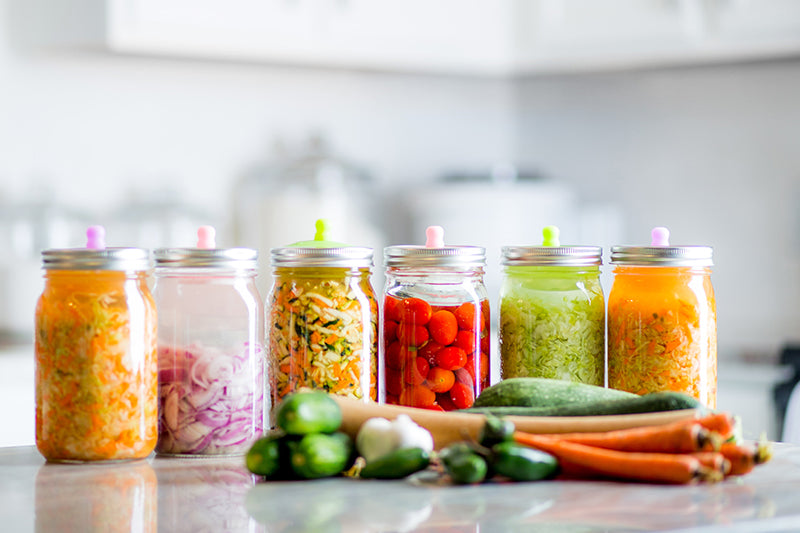 Pickled vegetables on kitchen countertop