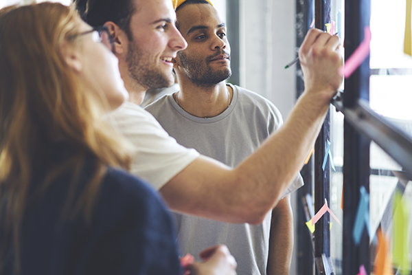 Workers collaborating on a project