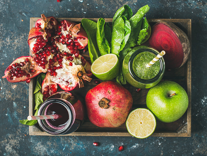 tray of healthy fruits, vegetables and juice